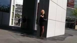 Candid smoking girl in business clothes