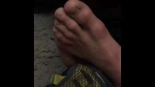 Guy strokes some cool feet in public in dorms hot hot feet